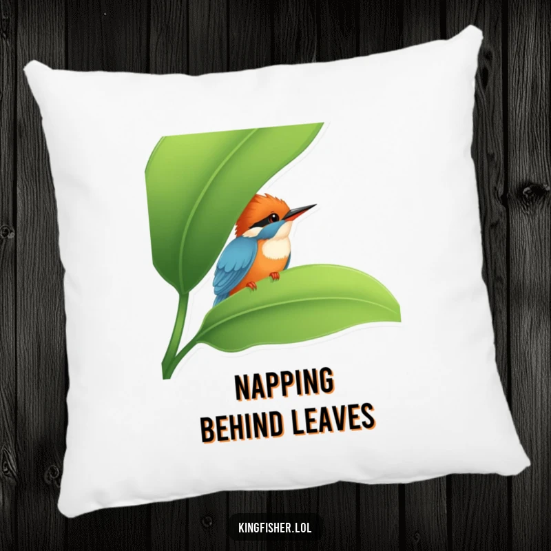 Funny Kingfisher Pillow: A soft pillow showcasing a shy kingfisher peeking from behind a leaf, a funny and cuddly decor item.