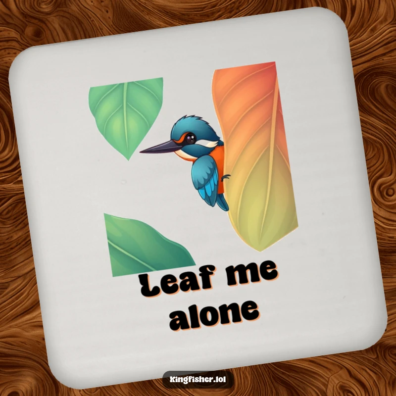 Funny cheerful kingfisher bird peeking from behind a large, colorful leaf on a drink coaster, protecting surfaces, a funny gift.