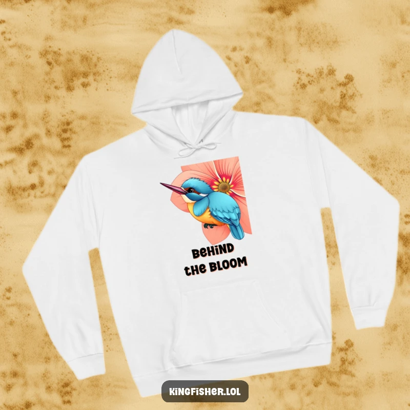 Funny hoodie with a curious kingfisher bird peeking from behind a large, bright flower, perfect for staying warm and playful.