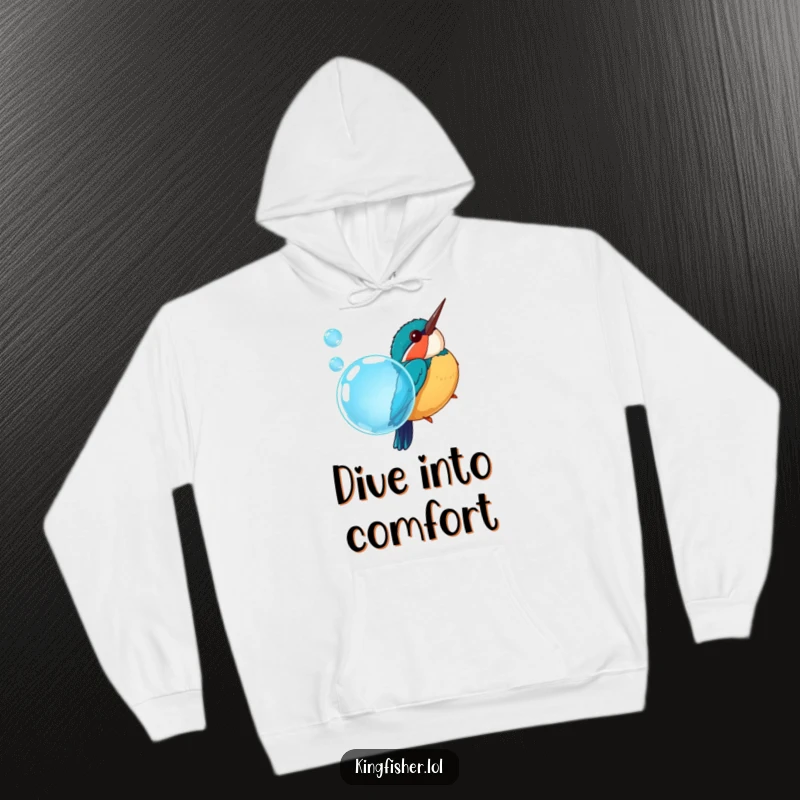 Funny hoodie with a chubby kingfisher bird diving into a bright blue bubble, exuding playful energy and warmth.