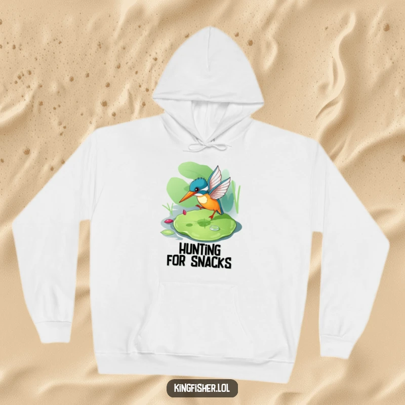 Funny kingfisher hoodie featuring a playful bird bouncing on a lily pad, ready for adventure.