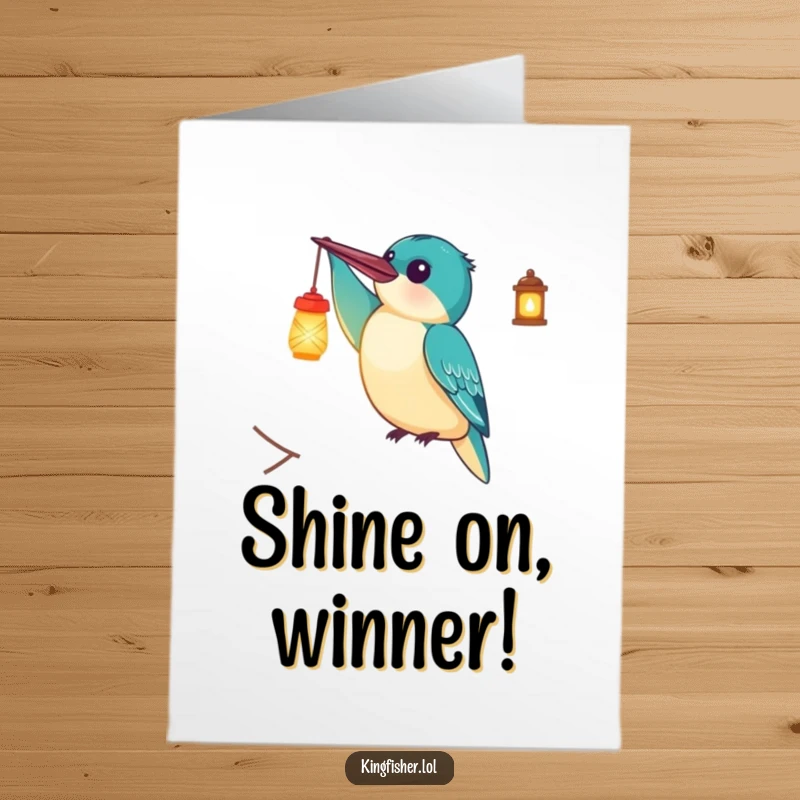 Funny Free Printable Congratulations Card with a delighted kingfisher bird holding a tiny, glowing lantern aloft, symbolizing achievement and joy.