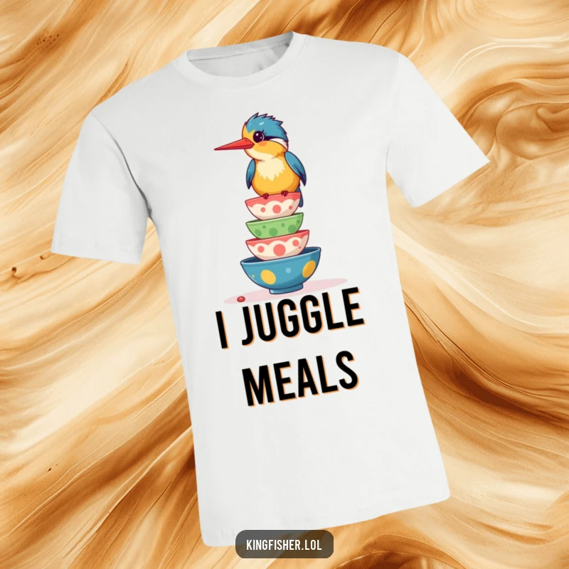 Funny t-shirt featuring a giggling kingfisher bird expertly balancing a wobbly tower of colorful food bowls, showcasing culinary skill.