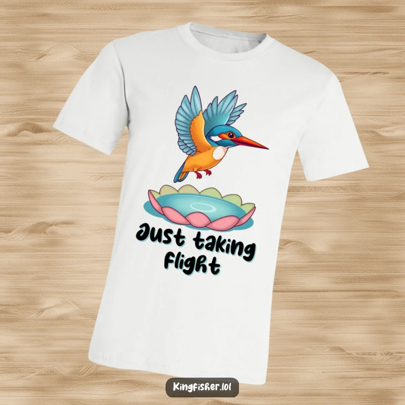 Funny Kingfisher T-Shirt: A colorful kingfisher dramatically taking flight from a lily pad, showcasing its wingspan in a funny pose.