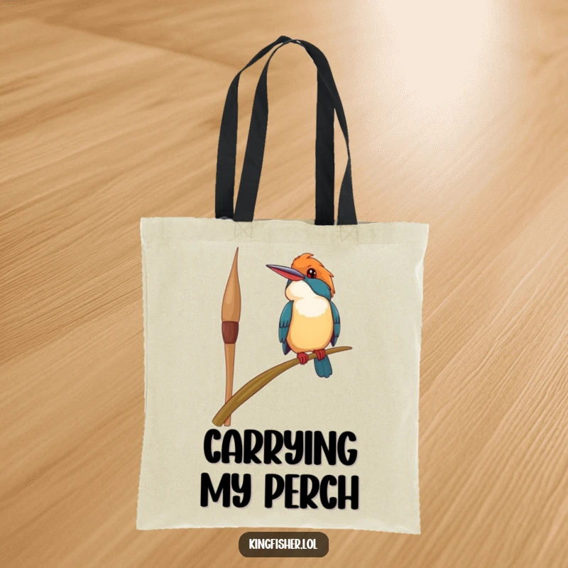 Funny happy kingfisher bird tote bag, perched precariously on a swaying reed, looking upwards with a smile, perfect for carrying items stylishly.