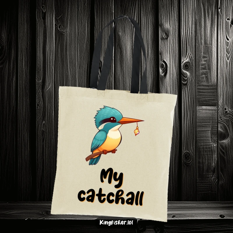 Funny Kingfisher Tote Bag showing a kawaii kingfisher with big eyes, catching a sparkling, tiny fish in its beak.